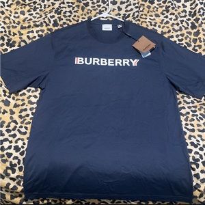 New Burberry T-shirts never worn. The grey is a medium and the blue one is small